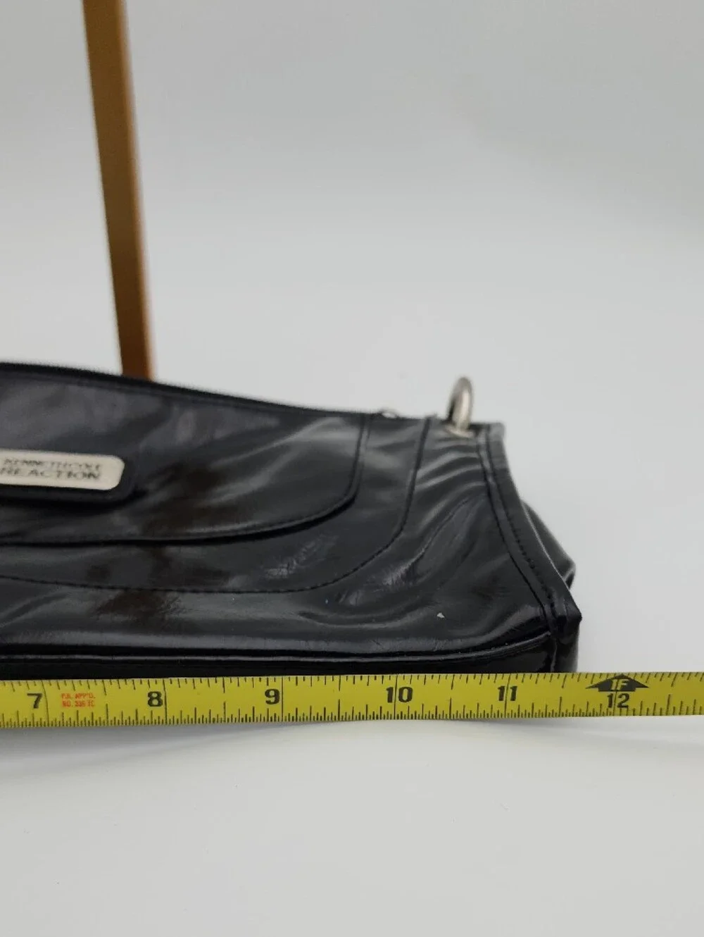 Kenneth Cole Reaction sleek patent